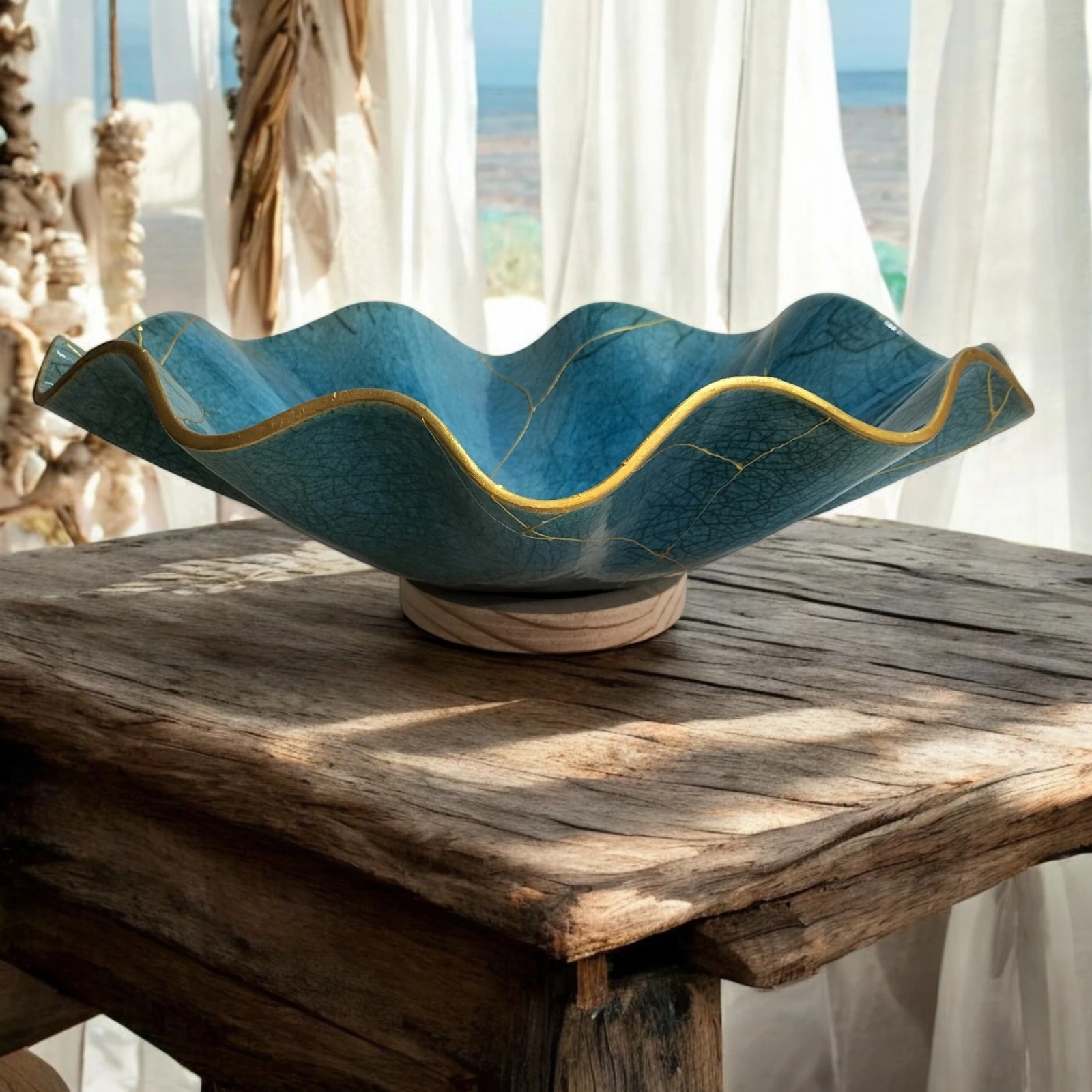 Raku blue belly bowl with gold